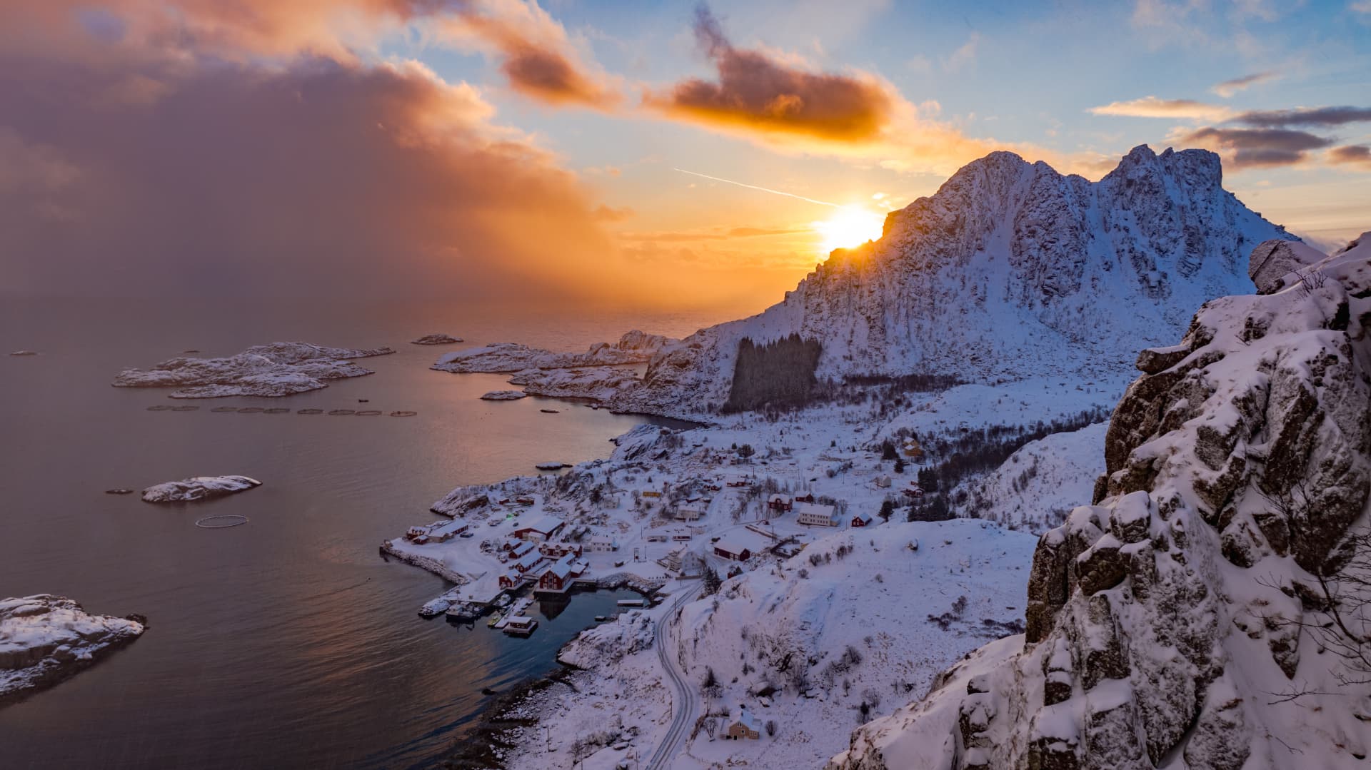 The fishing village of Ure sheltered between mountains and the Vestfjord